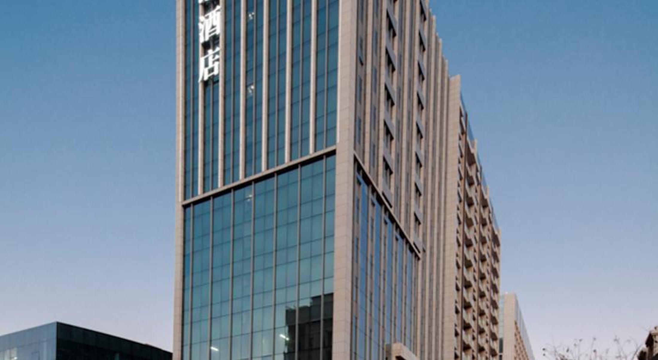فندق إيبيس تشينغداو تشينجيانج المظهر الخارجي الصورة